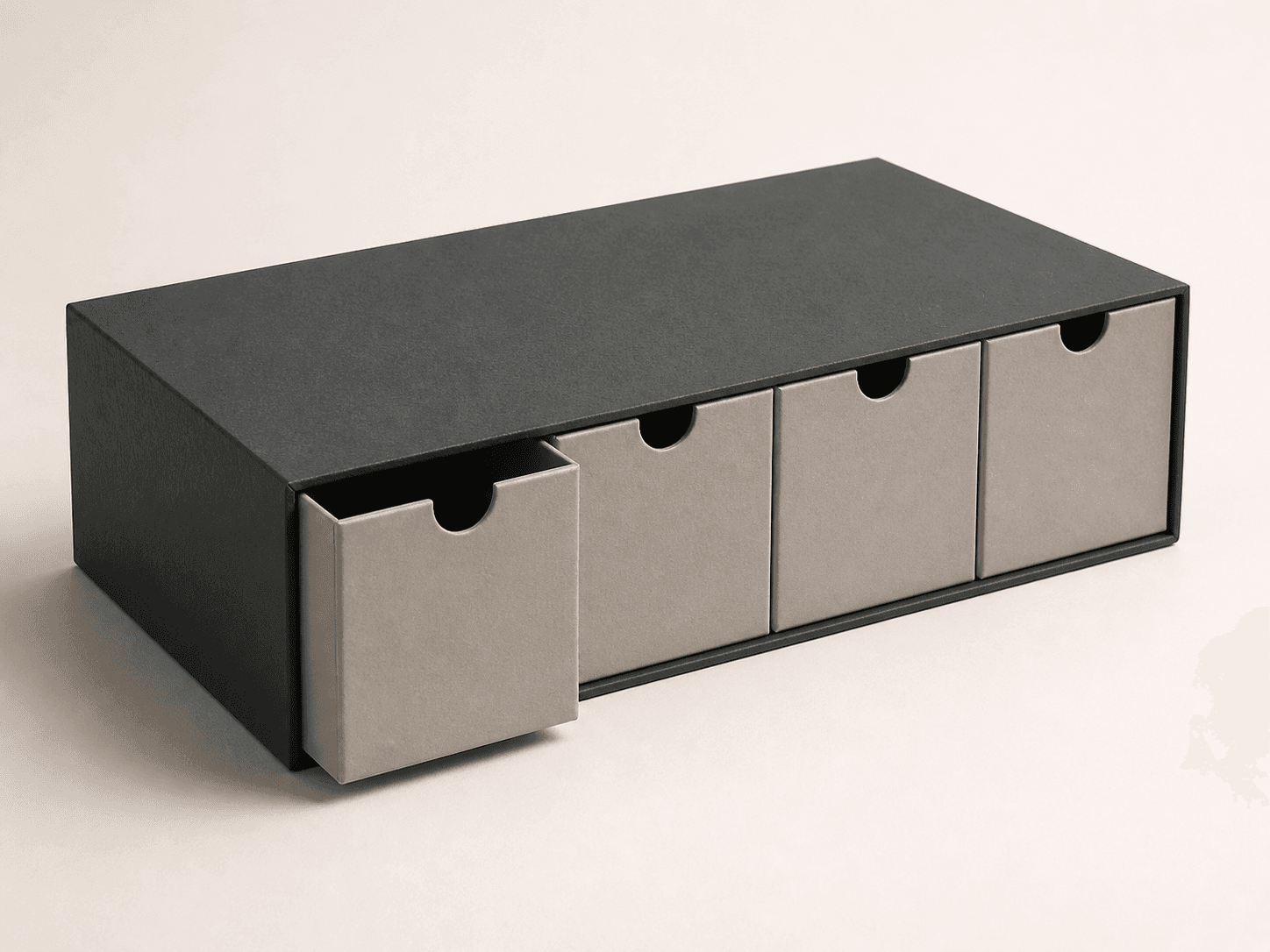Rigid slipcase with four pull drawers