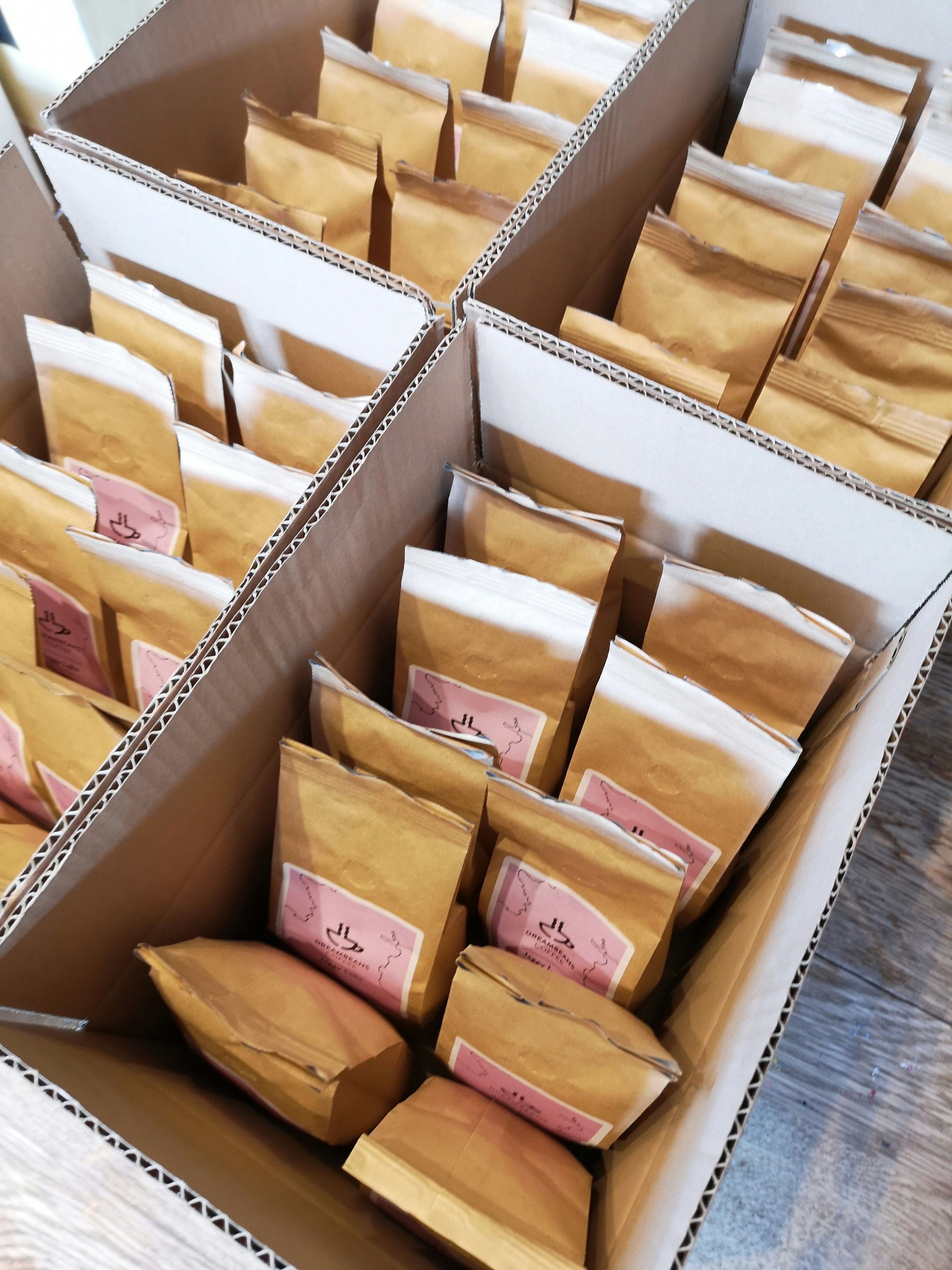 Corrugated boxes used as organized packing bins