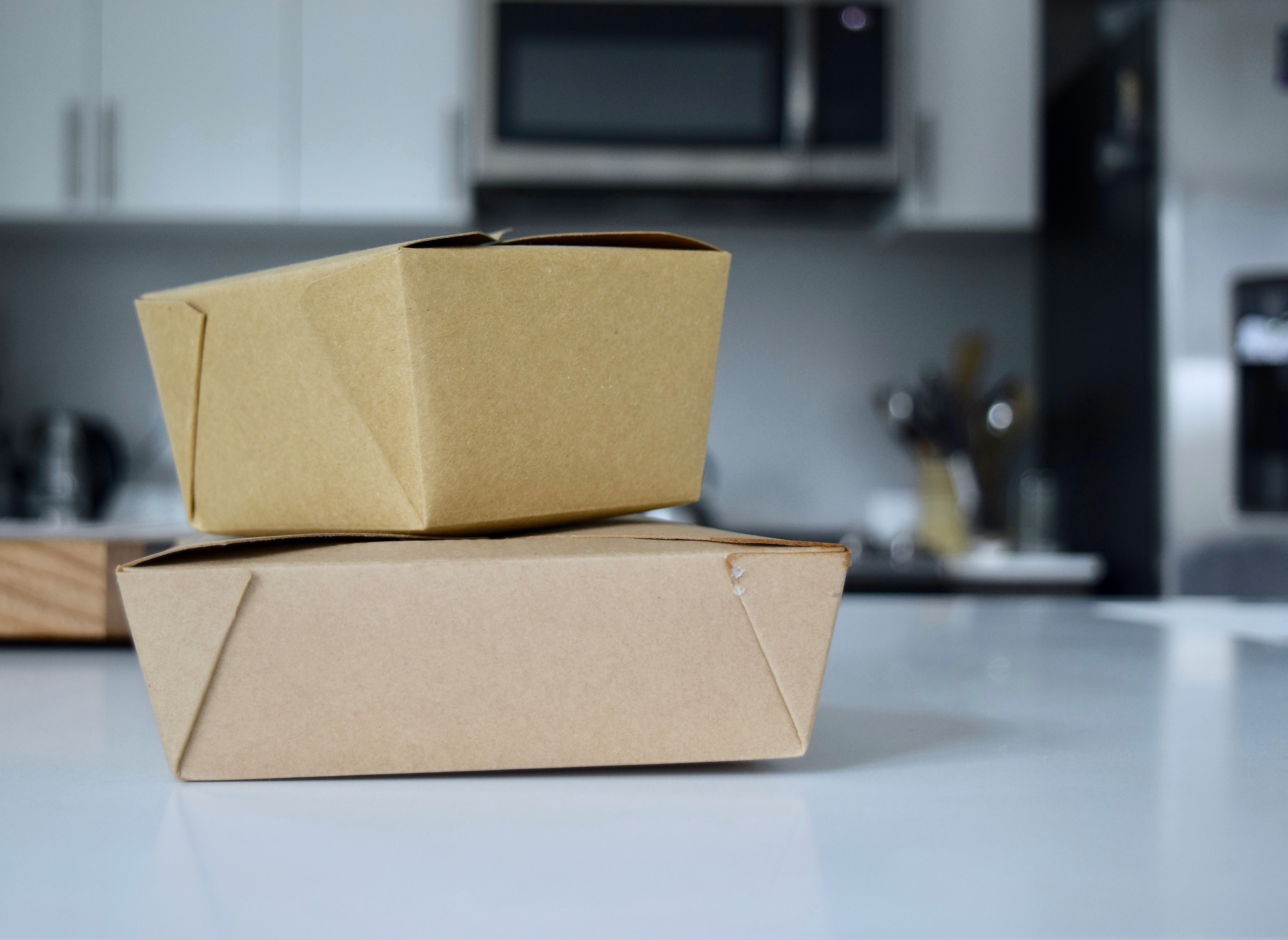 Stacked kraft paperboard food cartons
